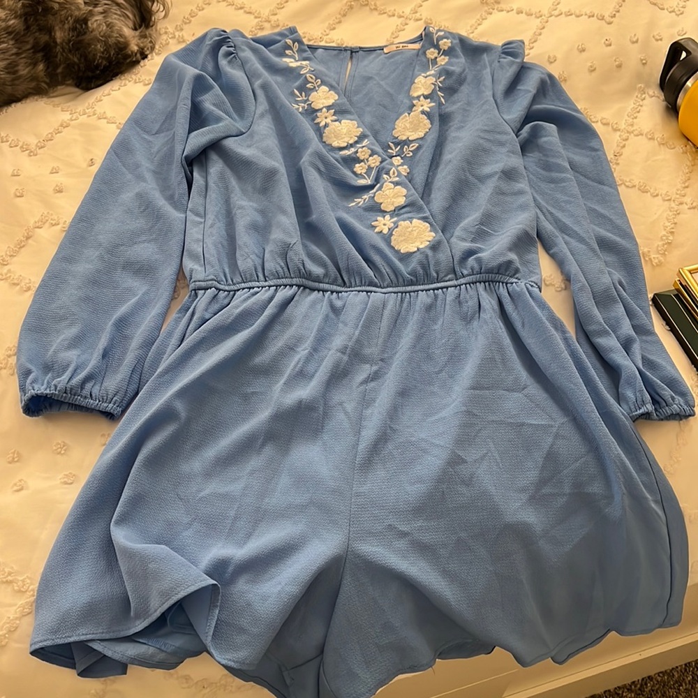Medium baby blue long sleeve romper with white floral embroidery, Mi ami